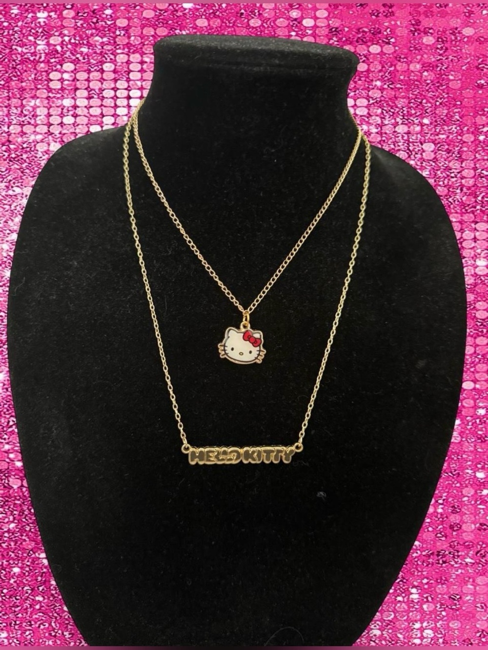 Hello Kitty gold chain necklace with Hello Kitty face pendant and 'HELLO KITTY'